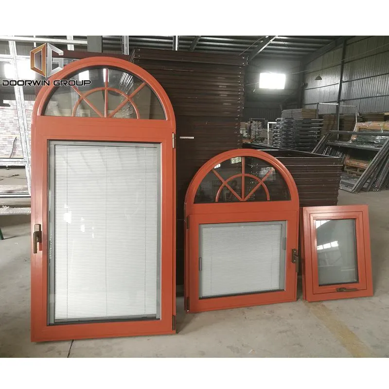 Doorwin 2021Arched Top Window with built-in shutter grills design pictures grilles grill-iron photos by Doorwin on Alibaba- ARCHITECT SERIES